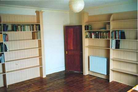 pine columns, shelves and tongue and groove backing