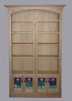 oak bookcase with four leaded glass panels, 2500