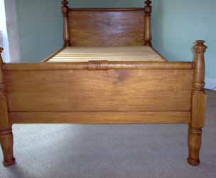 photo of a bed whose foot board we made to match the original headboard