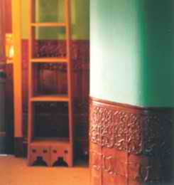 Art Nouveau style lincrusta on walls and painted to look like wood