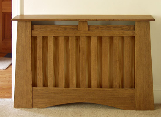 photograph of an oak "mission" style radiator cover/cabinet