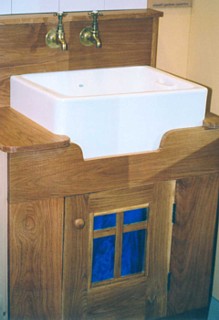 photograph of a handmade kitchen sink unit